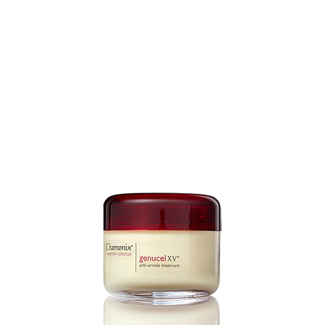 A small, clear jar of Genucel Skin Care Most Popular Package anti-wrinkle treatment is ready for your spa box. The jar has a red lid and the cream inside is off-white in color. The label on the jar features the product name and description in black and red text. The jar is isolated on a white background.